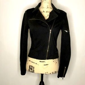 Surfer size small black jacket with zipper embellishments.